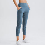 Odela – Pantalon Legging 7/8 à Poches colori bleu grisé - My Shop Yoga